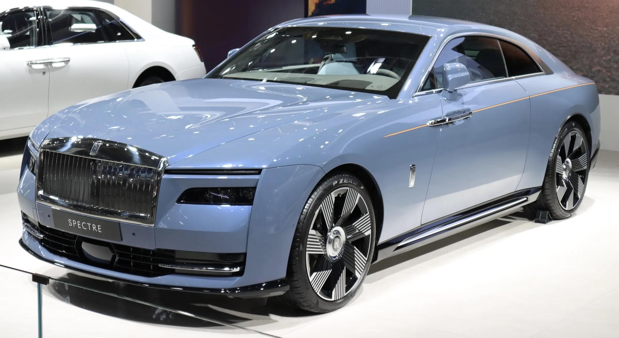 Rolls-Royce Spectre electric grand tourer in profile, the marque's first fully electric car